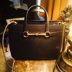 Gucci bag black leather gently used sturdy long strap can be used as cross body.